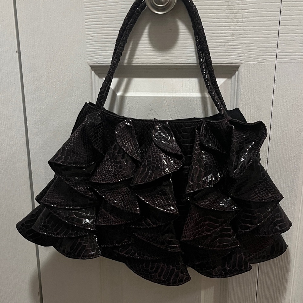 Elegant Raisin/purple colored Ruffled Handbag